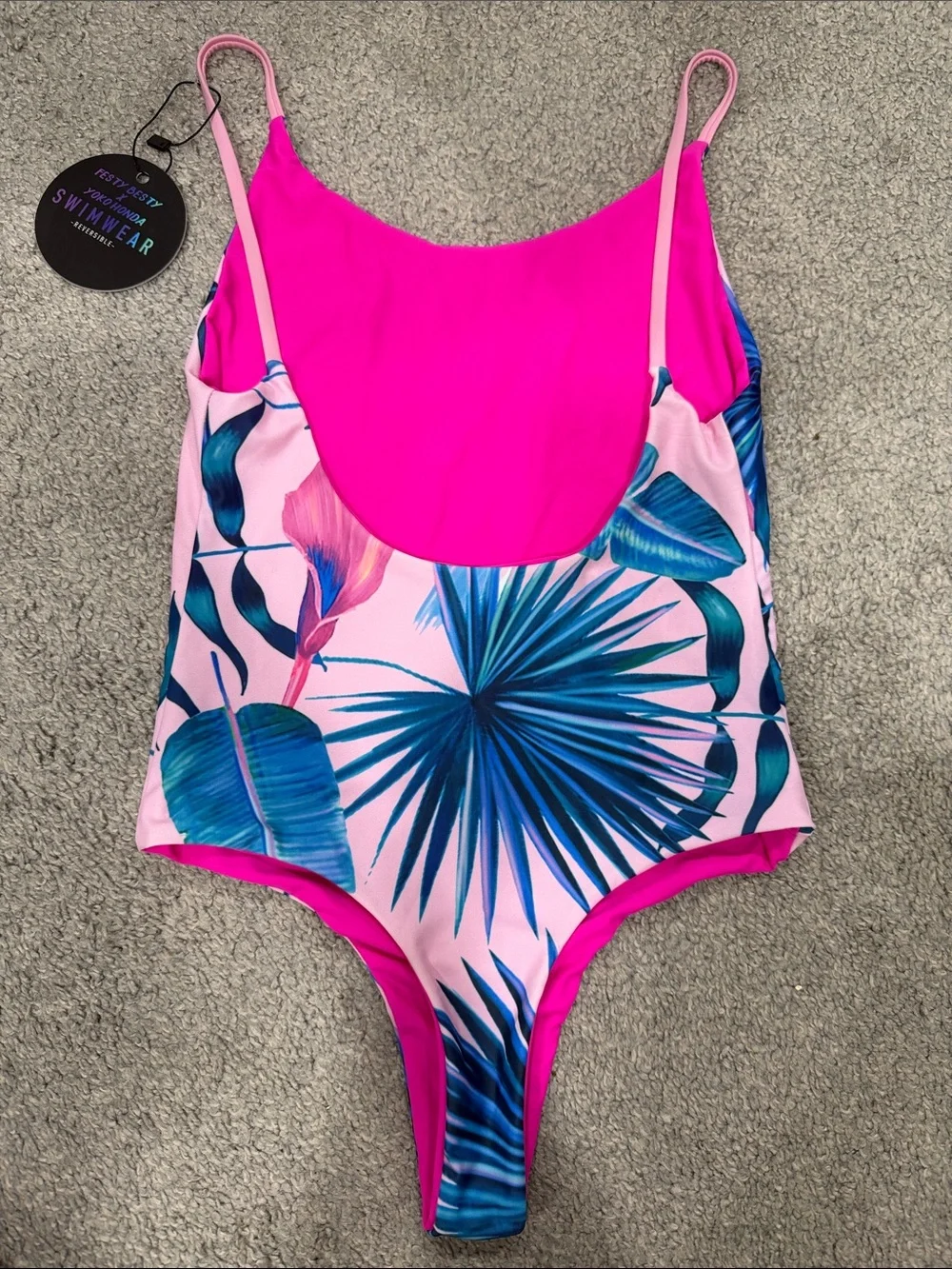 Roxy Pink One-Piece Swimsuit with Blue Tropical Leaf Design